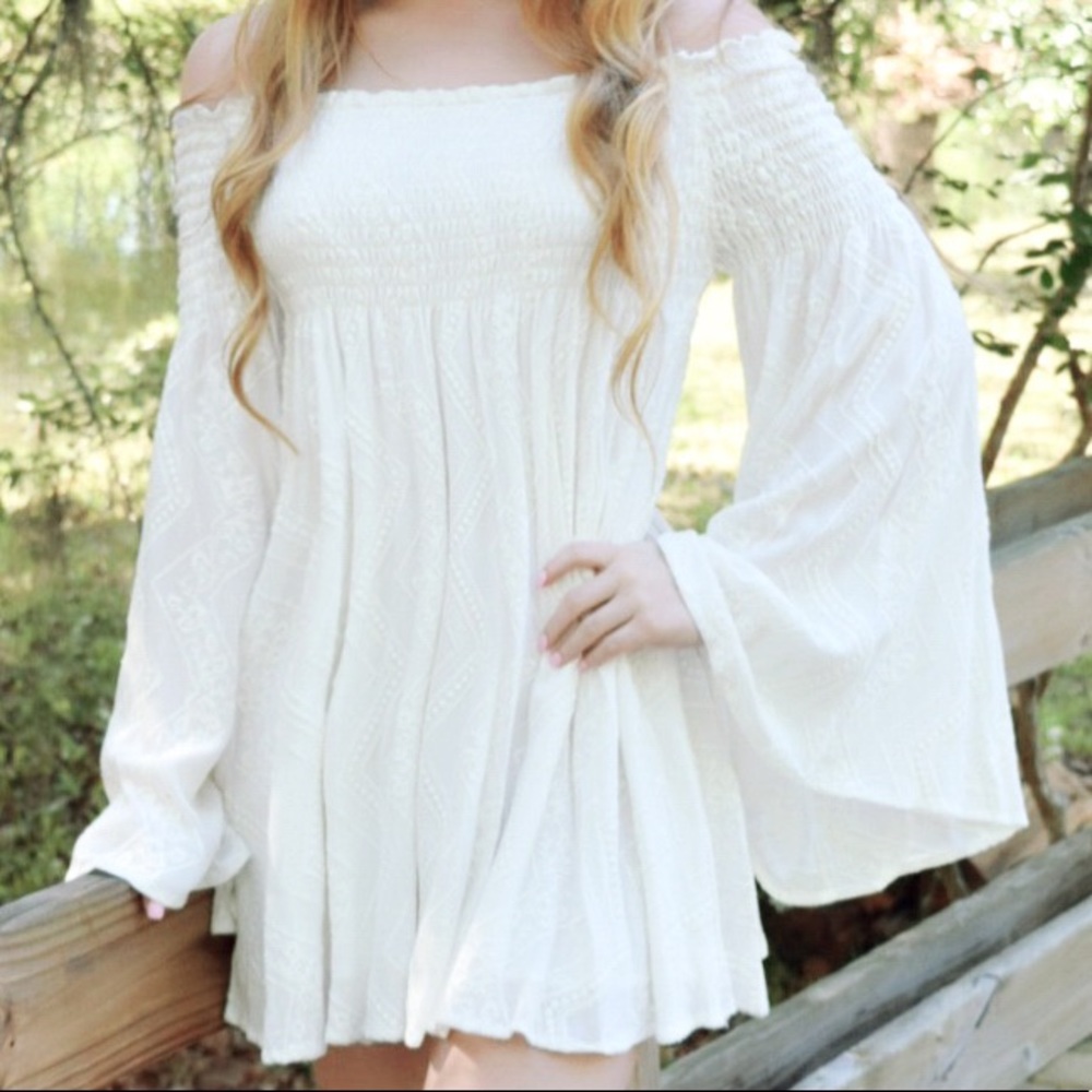 White long sleeve strapless dress